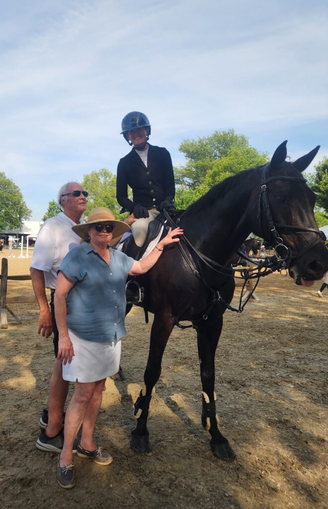 Ashley with her parents Peter and Louise